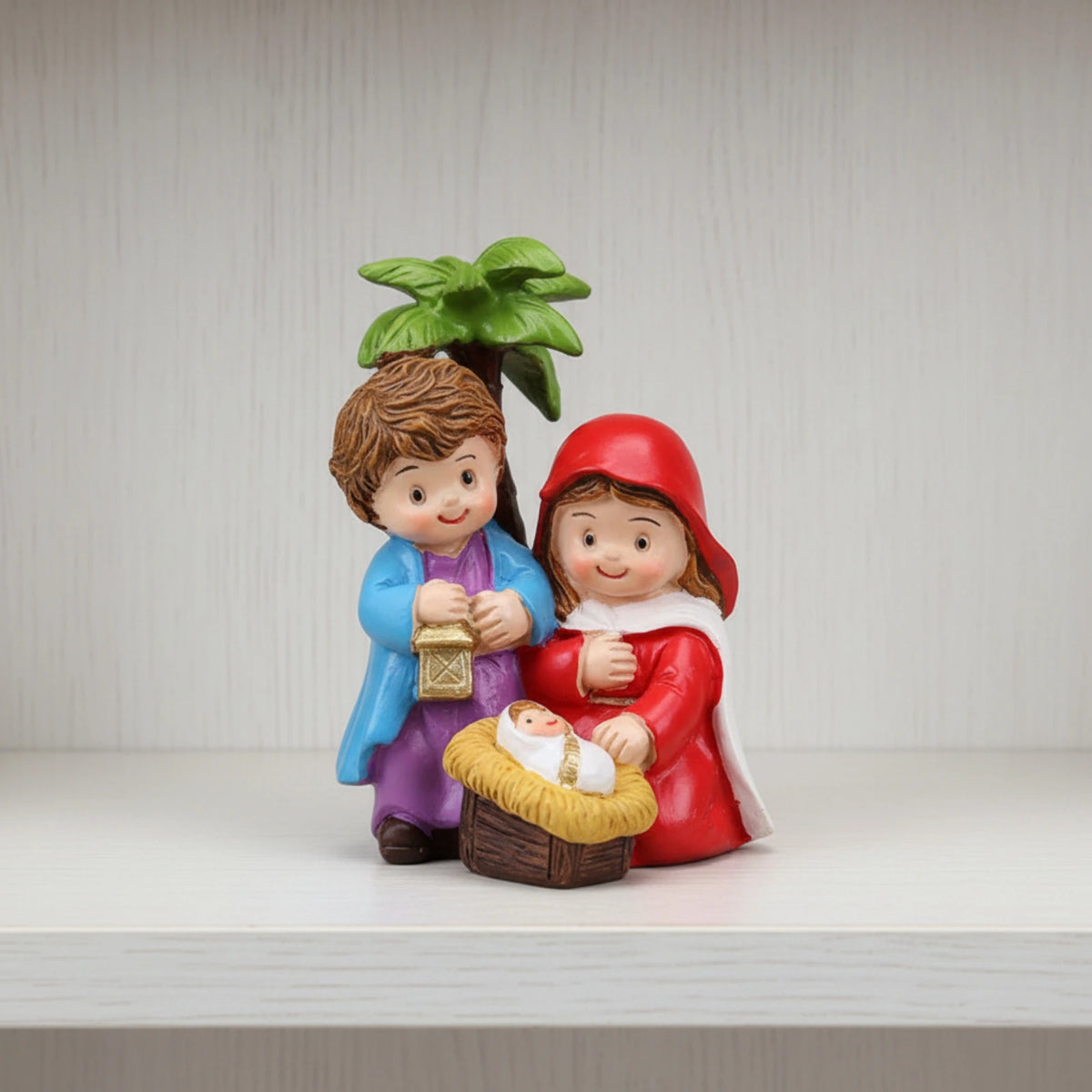 Petite crèche Sainte Famille avec palmier – résine – détail 2